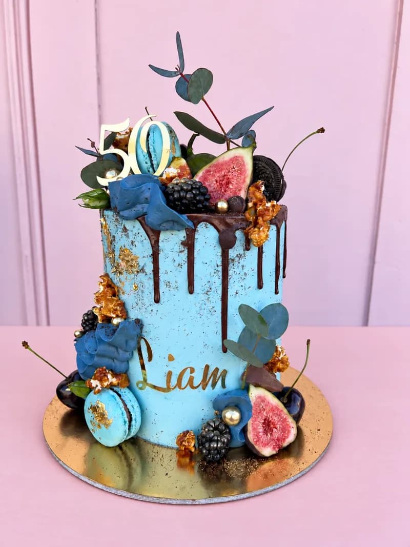 Blue drip 50th birthday cake for Liam with figs and berries