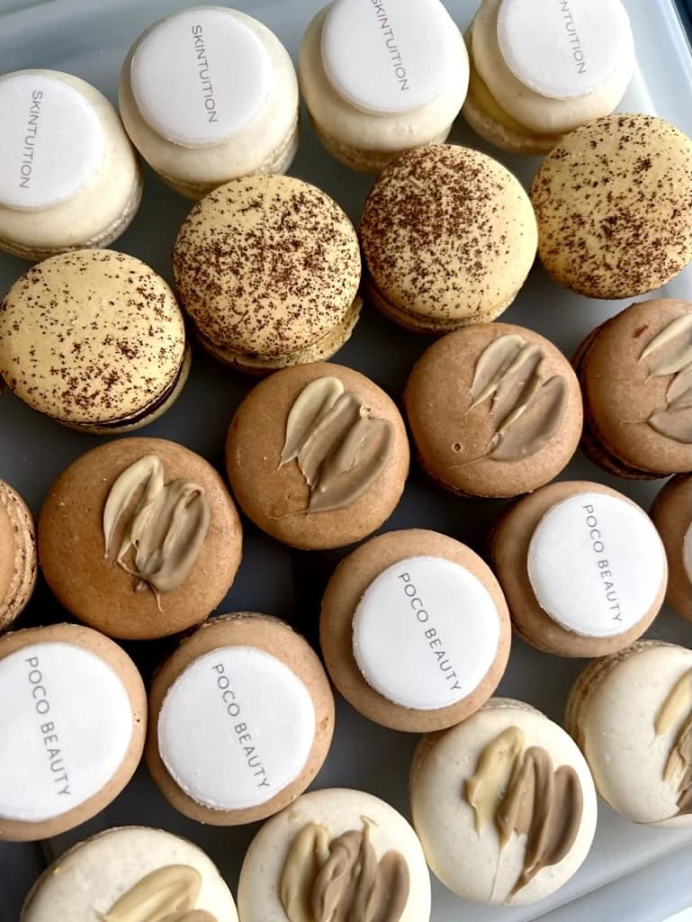 Macarons with a company logo