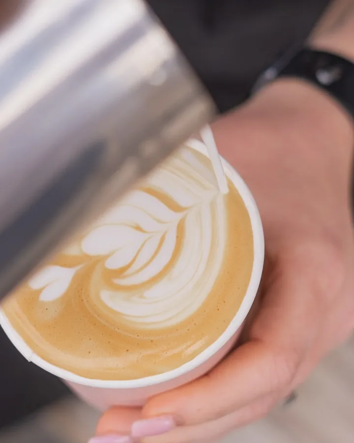 Latte art being poured at 2210